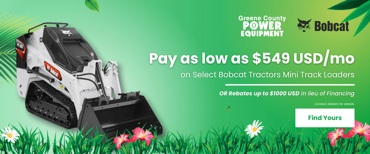 Bobcat mini track loader with summer grass and flowers, offering payments as low as $549 per month or $1,000 rebate at Greene County Power Equipment.
